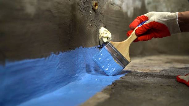 SJ Waterproofing Pros commercial waterproofing team near Wales, WI